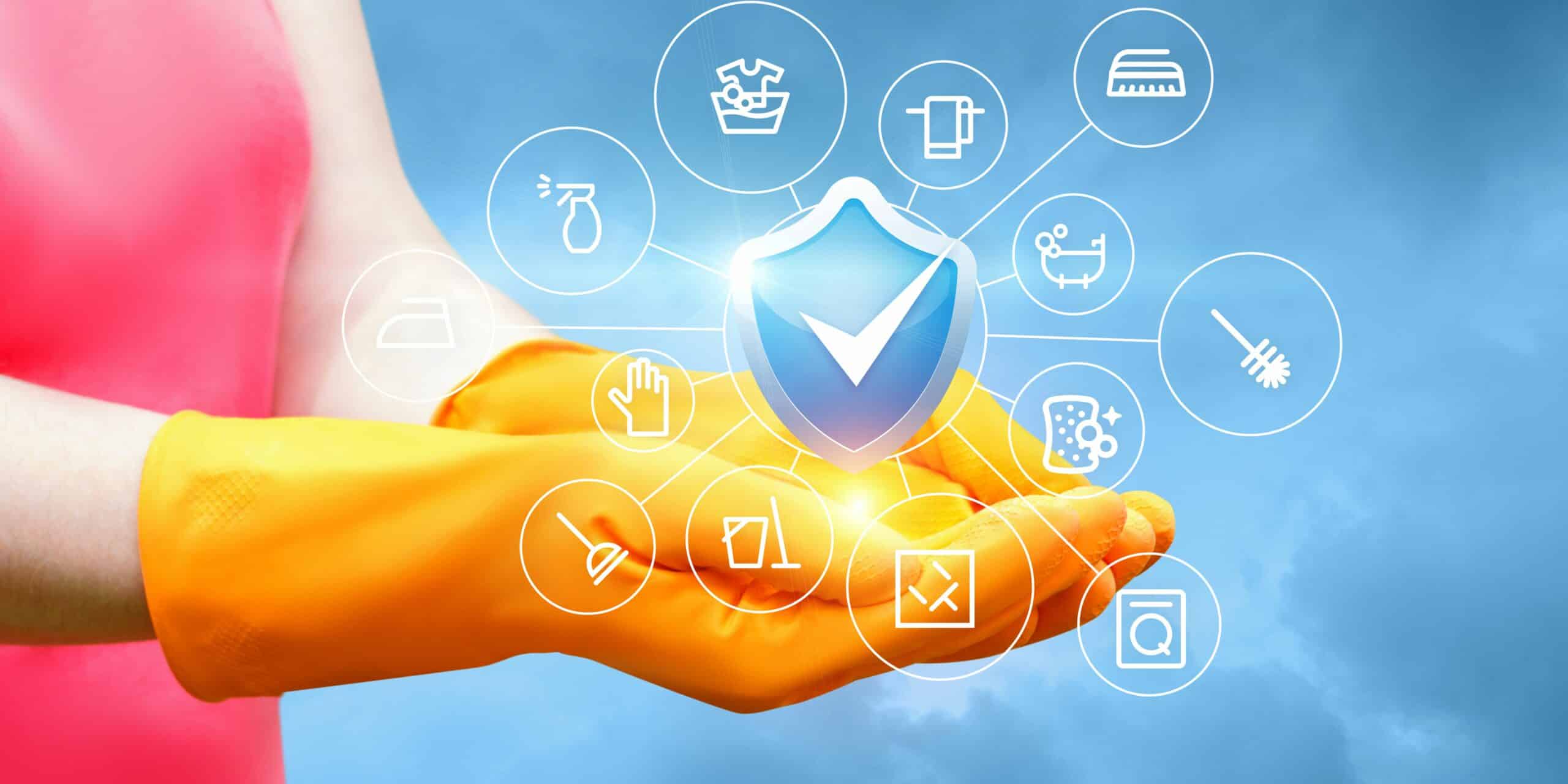 A lady wearing gloves with some cleaning icons hovering over her hands.